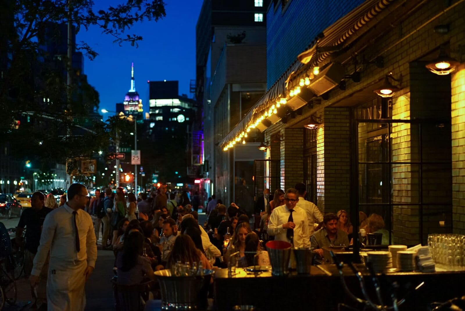 Neighborhood restaurant terrace at night